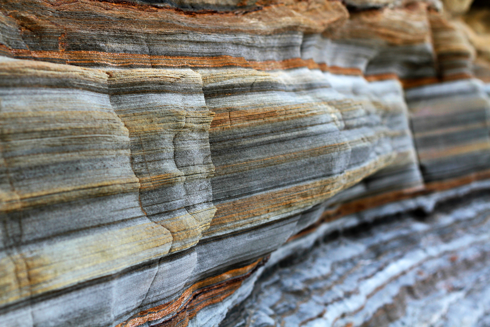 Mega Arbel Paving rock, a striped and layered rockface