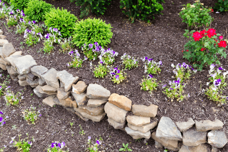 flower bed with decorative rocks